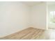 Bedroom featuring hardwood floors and natural light at 1533 Urban Trace Ln, Raleigh, NC 27608