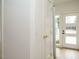 Hallway with white doors and trim at 1533 Urban Trace Ln, Raleigh, NC 27608