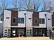 New contemporary townhouses with modern design, updated exterior and dark accents at 1533 Urban Trace Ln, Raleigh, NC 27608
