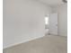 Spacious bedroom with neutral carpet and white walls at 791 Washington St, Fuquay Varina, NC 27526