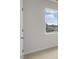 Bright bedroom with a large window and neutral carpet at 791 Washington St, Fuquay Varina, NC 27526