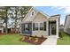 Charming single-story home featuring a mix of brick and siding, and a well-manicured lawn at 791 Washington St, Fuquay Varina, NC 27526