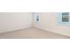 Bright bedroom featuring carpet flooring, neutral walls, and natural lighting at 802 Dorset Stream Dr, Fuquay Varina, NC 27526
