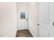Bright entryway with a white door with glass and a wood-look floor at 802 Dorset Stream Dr, Fuquay Varina, NC 27526