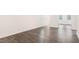 Living space boasts durable floors, natural light, and a modern aesthetic at 802 Dorset Stream Dr, Fuquay Varina, NC 27526