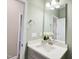 Bathroom with single vanity, white countertop, and modern fixtures at 144 Emerson Fields Dr, Pikeville, NC 27863