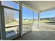 Outdoor screened in porch with a view of the backyard at 144 Emerson Fields Dr, Pikeville, NC 27863