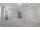 Neutral bedroom with gray walls, crown molding, and gray doors at 210 Colvard Farms Rd, Durham, NC 27713