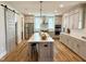 Spacious kitchen with modern appliances, a large island, and stylish cabinetry at 210 Colvard Farms Rd, Durham, NC 27713