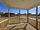 New construction covered porch with view of the backyards at 370 E Clydes Point Way, Wendell, NC 27591