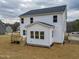 Exterior of new construction home featuring a back deck and backyard at 439 Duncan Creek Rd # 140, Lillington, NC 27546