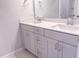 Bright bathroom featuring a double sink vanity with modern fixtures and a spacious mirror at 439 Duncan Creek Rd # 140, Lillington, NC 27546