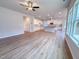 Spacious living area with wood floors, recessed lighting, and a seamless flow into the open kitchen at 439 Duncan Creek Rd # 140, Lillington, NC 27546