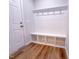 Mudroom featuring custom built-in bench and storage with convenient hooks at 439 Duncan Creek Rd # 140, Lillington, NC 27546