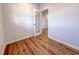 Cozy office space featuring wood flooring and glass door with view to another room at 439 Duncan Creek Rd # 140, Lillington, NC 27546