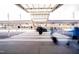 Busy airport terminal with pedestrian crosswalk, car lanes, and people with luggage at 6408 Tanner Oak Ln, Raleigh, NC 27613
