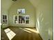 Spacious bedroom with large windows and hardwood floors at 1045 Cabin Creek, Pittsboro, NC 27312