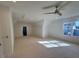 Spacious bonus room with carpeted floor and window at 1045 Cabin Creek, Pittsboro, NC 27312