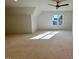 Spacious bonus room with carpeted floor and window at 1045 Cabin Creek, Pittsboro, NC 27312