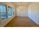Elegant dining room with hardwood floors and wainscoting at 1045 Cabin Creek, Pittsboro, NC 27312