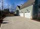 Three-car garage with ample parking space at 1045 Cabin Creek, Pittsboro, NC 27312