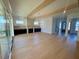 Open living room with hardwood floors and built-in shelving at 1045 Cabin Creek, Pittsboro, NC 27312