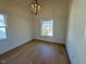 Bright office space featuring hardwood floors and large window at 1045 Cabin Creek, Pittsboro, NC 27312