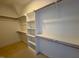 Spacious walk-in closet with ample shelving and hanging rods at 1045 Cabin Creek, Pittsboro, NC 27312