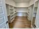 Large walk-in closet with built-in shelving at 1045 Cabin Creek, Pittsboro, NC 27312