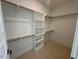 Bright walk-in closet with built in shelving at 1045 Cabin Creek, Pittsboro, NC 27312
