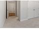 Bedroom with carpet and entryway to bathroom and closet at 130 Bold Dr, Youngsville, NC 27596