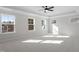 Bright bedroom with natural light streaming through multiple windows and tray ceilings at 130 Bold Dr, Youngsville, NC 27596