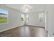 Bright and airy bedroom with large windows and beautiful hardwood floors at 413 Edison Rail Ln, Knightdale, NC 27545