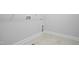 Laundry room featuring tile floors, white walls, hookups, and trim at 413 Edison Rail Ln, Knightdale, NC 27545