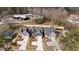 New construction homes showing landscaped yards and long driveways, convenient to nearby shopping and dining at 416 S Cross St, Youngsville, NC 27596