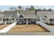 Private backyard featuring sod and a new white privacy fence at 416 S Cross St, Youngsville, NC 27596