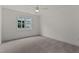 Bedroom with natural light and a ceiling fan at 416 S Cross St, Youngsville, NC 27596