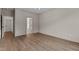 Bedroom features hardwood flooring, chandelier and a neutral color palette at 416 S Cross St, Youngsville, NC 27596
