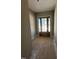 Light-filled entryway featuring an elegant glass-paneled front door with natural light at 103 Slocum Dr, Wendell, NC 27591