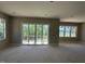 Spacious living area with sliding doors offering great natural light and a view at 103 Slocum Dr, Wendell, NC 27591