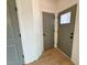 Entryway with hardwood floors and gray doors at 168 Grand Griffon Way, Lillington, NC 27546