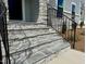 Beautiful stone steps lead to the front door of this new home at 168 Grand Griffon Way, Lillington, NC 27546