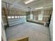 Spacious two-car garage featuring high ceilings and natural lighting at 168 Grand Griffon Way, Lillington, NC 27546