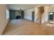 Bright living room boasts hardwood floors, a ceiling fan and cozy fireplace at 168 Grand Griffon Way, Lillington, NC 27546