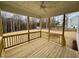 A porch perfect for relaxing, with views of the yard and surrounding forest at 168 Grand Griffon Way, Lillington, NC 27546