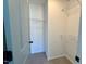 Walk-in closet featuring carpeted floor and multiple levels of wire shelving at 168 Grand Griffon Way, Lillington, NC 27546