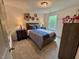 Bright bedroom decorated with floral accents, offering a cheerful and inviting space at 196 Grand Griffon Way, Lillington, NC 27546