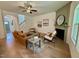 Inviting living room with a modern fireplace, hardwood floors, and an open view of the staircase at 196 Grand Griffon Way, Lillington, NC 27546