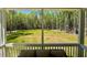 Enjoy the views from the screened in porch at 196 Grand Griffon Way, Lillington, NC 27546