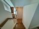 Beautiful staircase with wood treads and white risers and railings at 196 Grand Griffon Way, Lillington, NC 27546